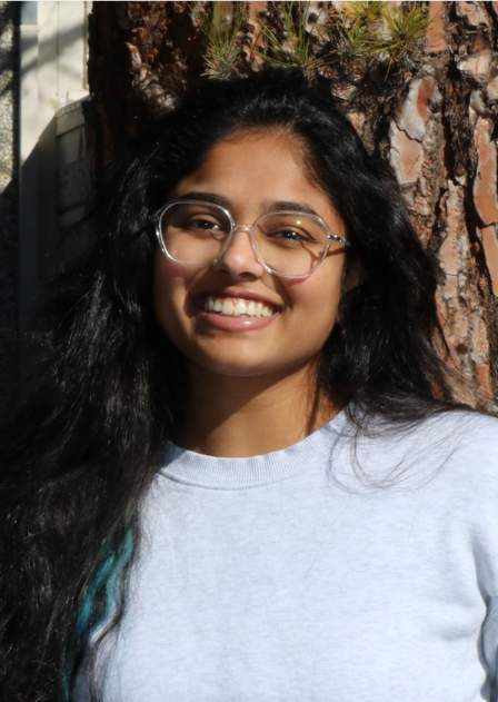 Photo of NDNU student, Shuchi, outside and smiling