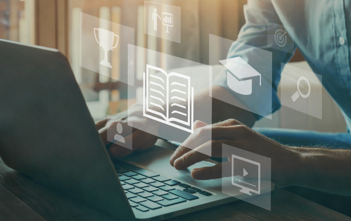 person sitting at computer with images of applications